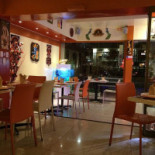 Saffron Indian Delicacies Dentro